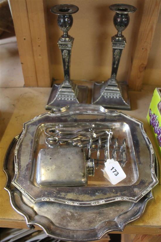 Pair of plated candlesticks, 2 plated salvers and 5 other plated items